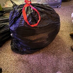 Big bag full of baby clothes